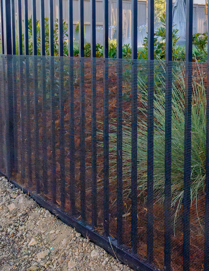 wrought iron fence with rattlesnake proof wire mesh